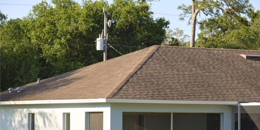 Residential home with an asphalt shingle roof installed by Roof Dudes Midwest. Specializing in durable and energy-efficient asphalt shingle roofing, Roof Dudes provides expert roof installations, replacements, and repairs for homes in Cincinnati.