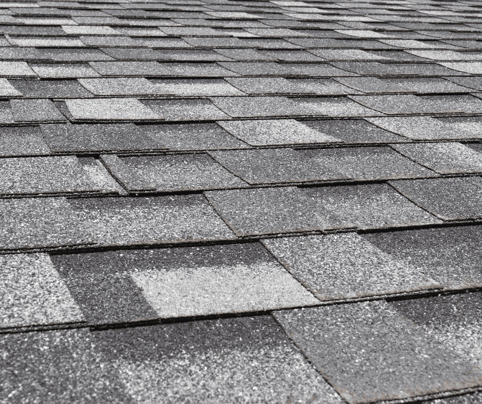 Close-up of asphalt shingles, a popular roofing choice for homes in West Chester. They are affordable, durable, and can handle Cincinnati’s weather.