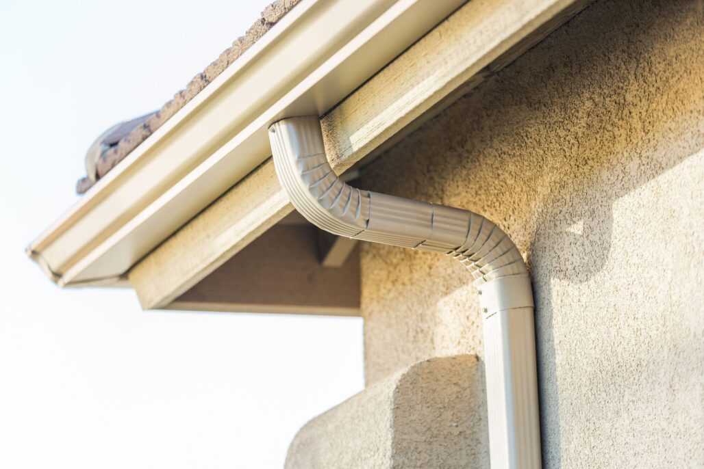 House with New Seamless Aluminum Rain Gutters.